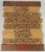 A VERY FINE AND LARGE 18TH-19TH CENTURY BURMESE OR SRI LANKAN LACQUERED PRAYER BOOK, 54cm x 9cm.