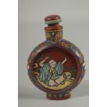 AN UNUSUAL CHINESE YIXING SNUFF BOTTLE AND STOPPER, with enamel painted decoration, 8.5cm high.