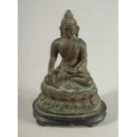 A SMALL BRONZE SEATED BUDDHA ON DOUBLE-LOTUS BASE, Shakyamuni in dhyanasana, mounted to a wooden