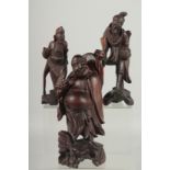 THREE CHINESE CARVED WOOD FIGURES, (3).