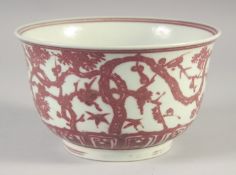 A CHINESE UNDER GLAZE RED AND WHITE PORCELAIN BOWL, six-character mark to base, 18cm diameter.