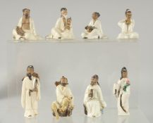 A COLLECTION OF EIGHT SMALL CHINESE PORCELAIN FIGURES, (8).