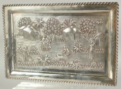 A FINE LARGE 19TH CENTURY INDIAN CALCUTTA RAJ PERIOD SILVER TRAY, with embossed and finely chased