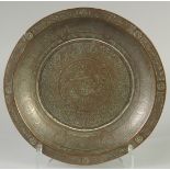 A FINE AND LARGE 15TH-16TH CENTURY MAMLUK ENGRAVED COPPER CHARGER, with calligraphy and arabesque