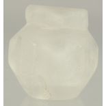 A SMALL ISLAMIC CARVED ROCK CRYSTAL VESSEL, 3cm high.