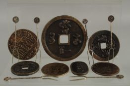 A COLLECTION OF CHINESE FORTUNE COINS, together with a collection of hairpins, (qty).