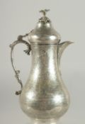 A FINE 19TH CENTURY OTTOMAN TURKISH SILVER COFFEE POT WITH TUGHRA MARKS, 21cm high.