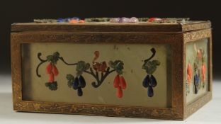 A 19TH CENTURY CHINESE JADE PANELLED RECTANGULAR BOX, overlaid with various stones depicting hanging