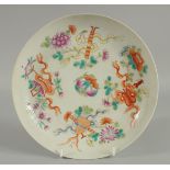 A 19TH CENTURY CHINESE FAMILLE ROSE PORCELAIN PLATE, painted with peaches and bat, flora, and