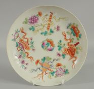 A 19TH CENTURY CHINESE FAMILLE ROSE PORCELAIN PLATE, painted with peaches and bat, flora, and