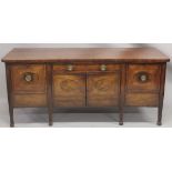 A GOOD GEORGE III MAHOGANY STRAIGHT FRONTED SIDEBOARD with plain legs and ovals to the front, with