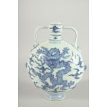A CHINESE BLUE AND WHITE TWIN HANDLE MOON FLASK with dragon to each side. 28ins high.