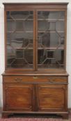 A LARGE GEORGIAN MAHOGANY STANDING BOOKCASE the top with double panel glazed doors, the base with