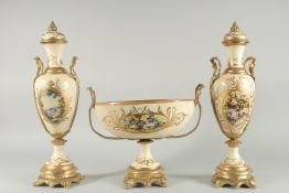 A SEVRES DESIGN CREAM PORCELAIN THREE PIECE GARNITURE painted with flowers, comprising of a pair