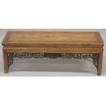 A CHINESE REDWOOD OPIUM TABLE 4ft long, 1ft4ins high.
