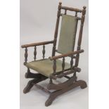 A SMALL AMERICAN ROCKING CHAIR.