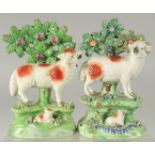 A PAIR OF STAFFORDSHIRE BOCAGE GROUP OF SHEEP AND LAMBS with Bocage backs. 6ins high.