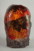 A LARGE AMBER, inset with a butterfly. 8.5Iins high