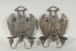 A GOOD PAIR OF BRONZE BATS, TWO BRANCH WALL SCONCES. 13ins high.