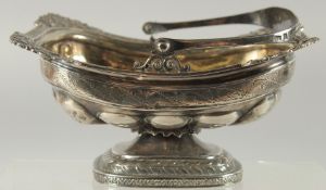 A GOOD RUSSIAN SILVER PEDESTAL BASKET with swing handles. Marks, H. A. over 1823. 84.