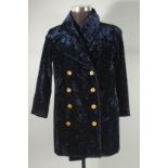 A CHANEL NAVY CRUSHED VELVET JACKET with silk lining and Chanel buttons. Size 42.