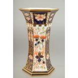 A ROYAL CROWN DERBY HEXAGONAL VASE. Pattern 6299.