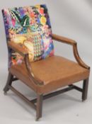 A GOOD GEORGE III MAHOGANY GAINSBOROUGH CHAIR with padded curving arms, leather seat on square