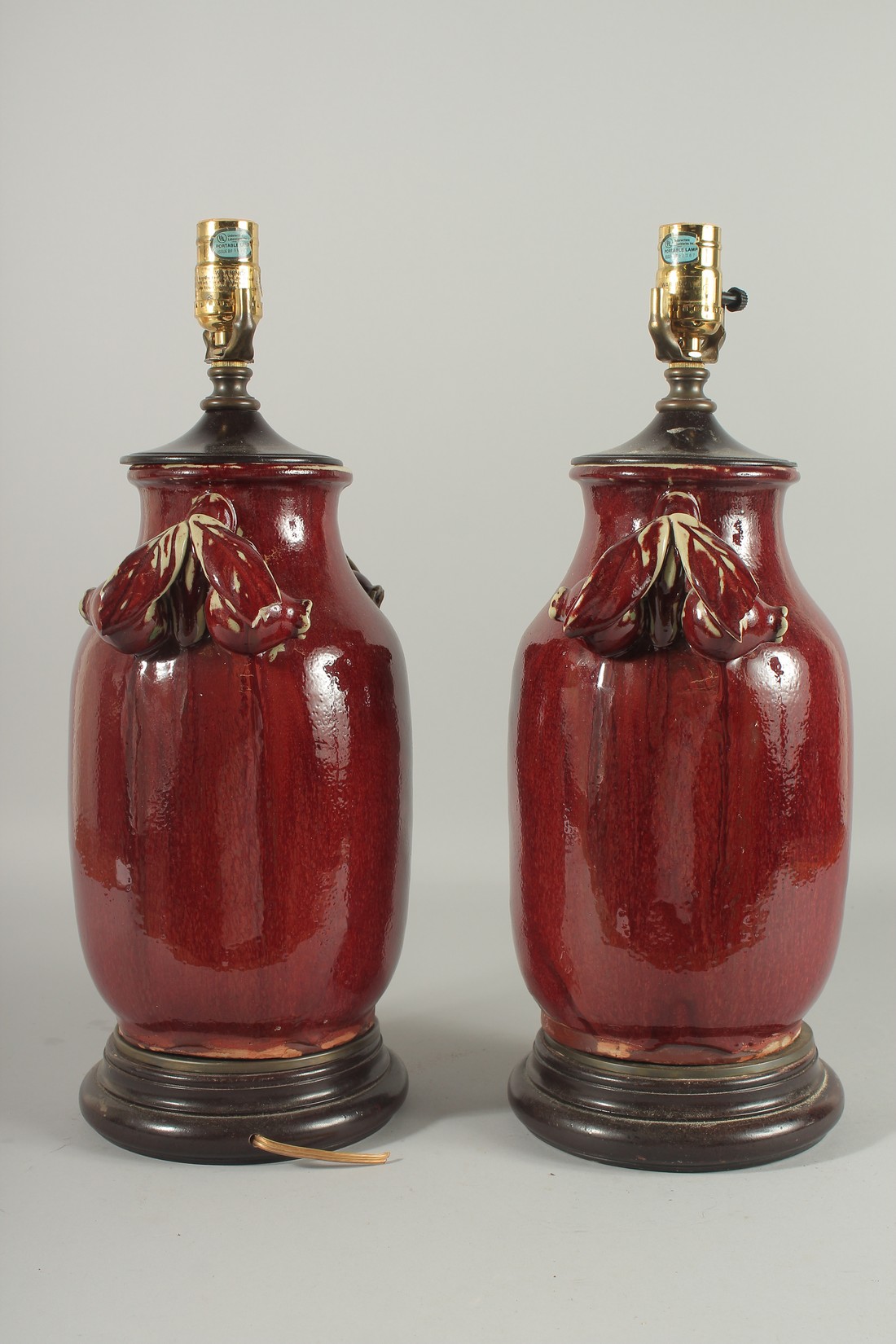 A PAIR OF CHINSE SANG DE BOEUF PORCELAIN LAMPS. 18ins high. - Image 2 of 2