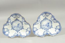 A PAIR OF ROYAL CROWN DERBY DISHES, the centres painted with sailing vessels by W.E.J. DEAN.