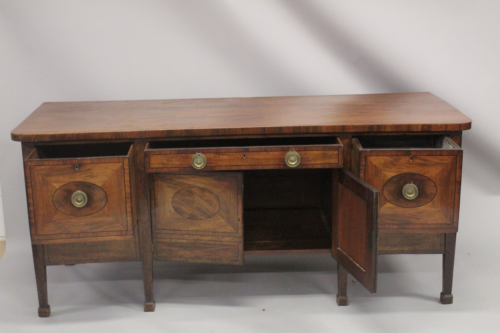 A GOOD GEORGE III MAHOGANY STRAIGHT FRONTED SIDEBOARD with plain legs and ovals to the front, with - Image 2 of 6