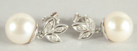 A PAIR OF 18 CARAT WHITE GOLD, PEARL AND DIAMOND EARRINGS.