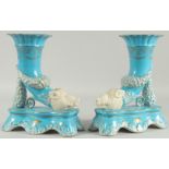 A PAIR OF SEVRES STYLE BLUE BOARS HEAD CORNUCOPIA VASES. 16ins high