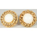 A GOOD PAIR OF CHANEL GILT AND PEARL CIRCULAR EAR CLIPS stamped Chanel, Made in Paris. 3cm