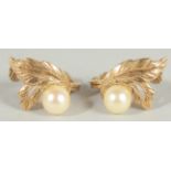 A PAIR OF 9CT GOLD AND PEARL EAR CLIPS.