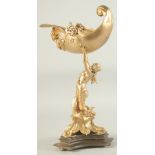 A GILT BRONZE CLASSICAL FIGURE holding a shell. 15ins high.