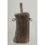 A GOOD SMALL LEATHER CLAD POWDER FLASK. 6ins long.
