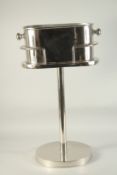 AN OVAL WINE COOLER on a stand. 28ins high.