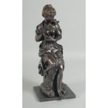 A 19TH CENTURY BRONZE OF A YOUNG GIRL holding a nest of birds. 12ins high