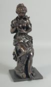 A 19TH CENTURY BRONZE OF A YOUNG GIRL holding a nest of birds. 12ins high