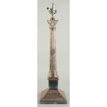 A PLATED CORINTHIAN COLUMN LAMP on a stepped base. 23ins high.