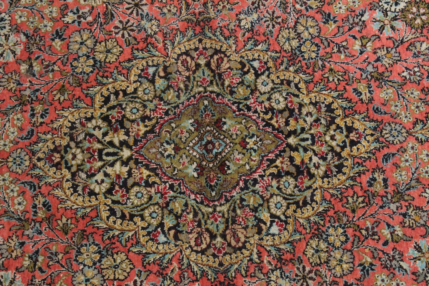 A PERSIAN PART SILK CARPET pink ground with sylised floral decoration within a similarly border. - Image 3 of 4