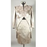 A CATHERINE WALKER TWO PIECE SILK TAUPE SKIRT AND JACKET SUIT, a plain skirt and tailed jacket