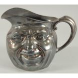 A SILVER PLATED TOBY JUG. 6.5ins high.