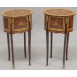 A PAIR OF LOUIS XVTH DESIGN OVAL BEDSIDE TABLES with three drawers. 2ft 4ins high.
