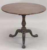 A LARGE GEORGE III MAHOGANY CIRCULAR TOP TABLE with birdcage support, centre turned pillar ending in