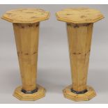 A PAIR OF ART DECO STYLE OCTAGONAL STANDS. 2ft 7is high.