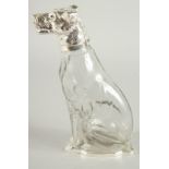 A GOOD SILVER PLATED GLASS 'DOG' CLARET JUG with blue eyes. 10ins high.