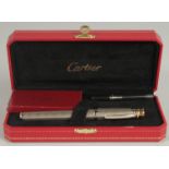 A CARTIER PEN AND REFILS, boxed with papers.