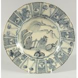 A CHINESE BLUE AND WHITE PORCELAIN PLATE with figures. 10.75ins diameter.