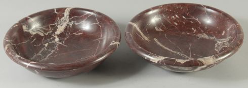 A PAIR OF LATE 19TH CENTURY/ EARLY 20TH CENTURY TURNED VARIEGATED ROUGE MARBLE BOWLS. 10ins